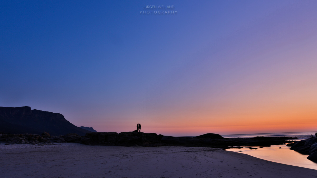  Couple facing the Sunset 