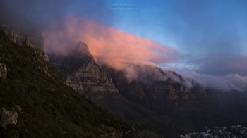  Orange clouds covering Table mountain 